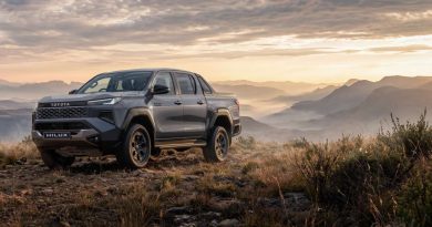 New-generation 2026 Toyota Hilux Legend 4x4 parked on a mountain ridge in South Africa at sunrise