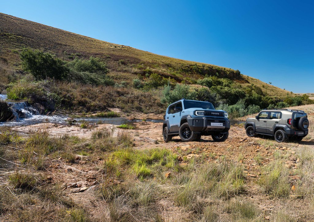 Toyota Land Cruiser FJ parked on rocky terrain next to a stream during its South African launch